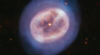 美丽还是困扰？哈勃太空望远镜捕捉到一颗老化恒星的气态光芒